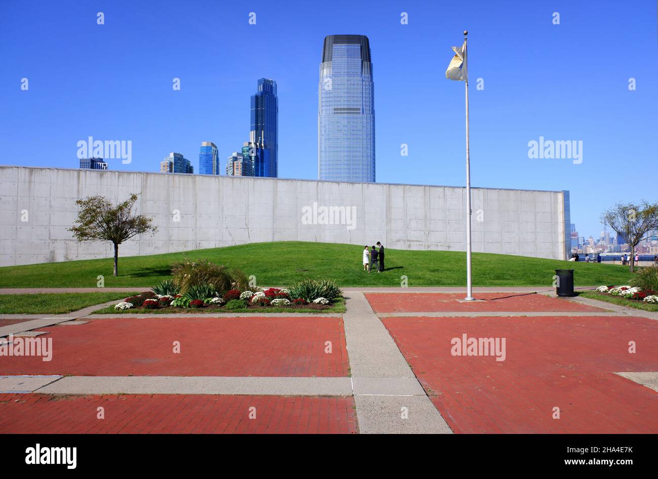The Empty Sky NJ 9/11 Memorial in Liberty State Park with Goldman Sachs Tower in Jersey City in the background.New jersey.USA Stock Photo