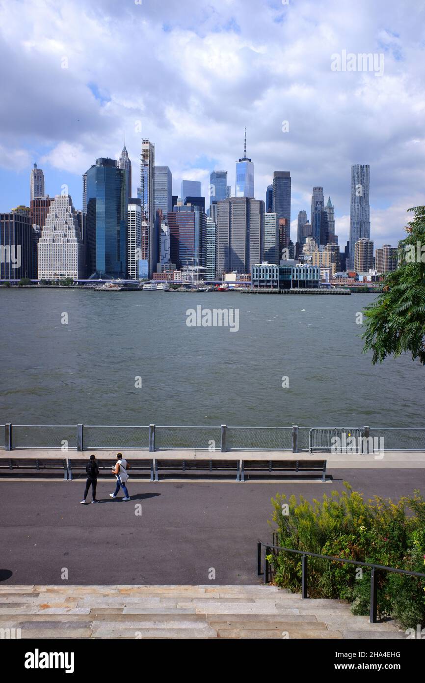 The view of Financial District of Lower Manhattan and East River from the Granite Prospect in Brooklyn Bridge Park.Brooklyn.New York City.USA Stock Photo