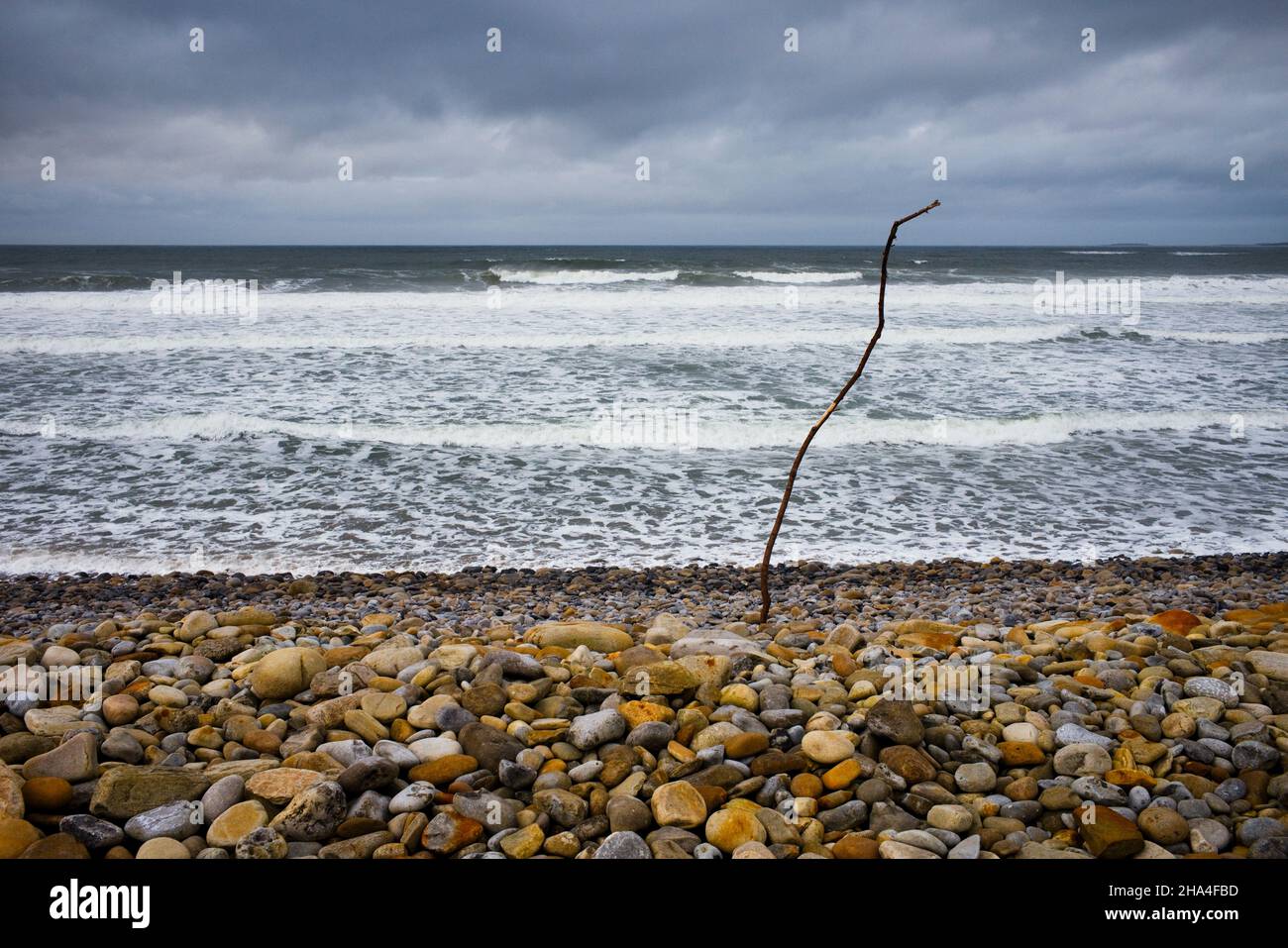 Heavy surf at Strandhill beach, Sligo, Ireland with pebble beach and