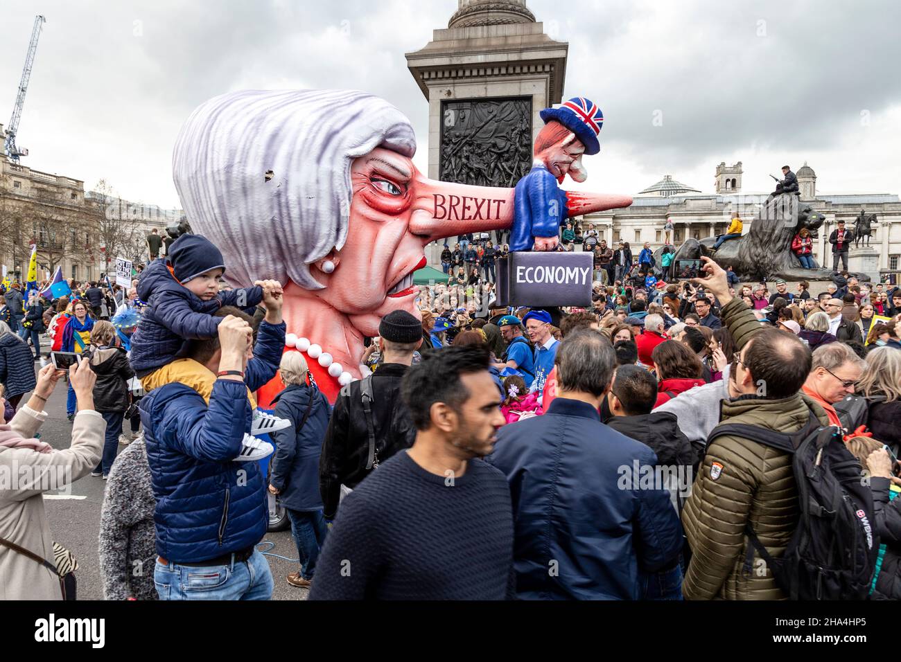 London, UK. 23rd Mar 2019 Over a million people march for the People’s Vote, for a second referendum on Brexit, Theresa May puppet with long nose Stock Photo