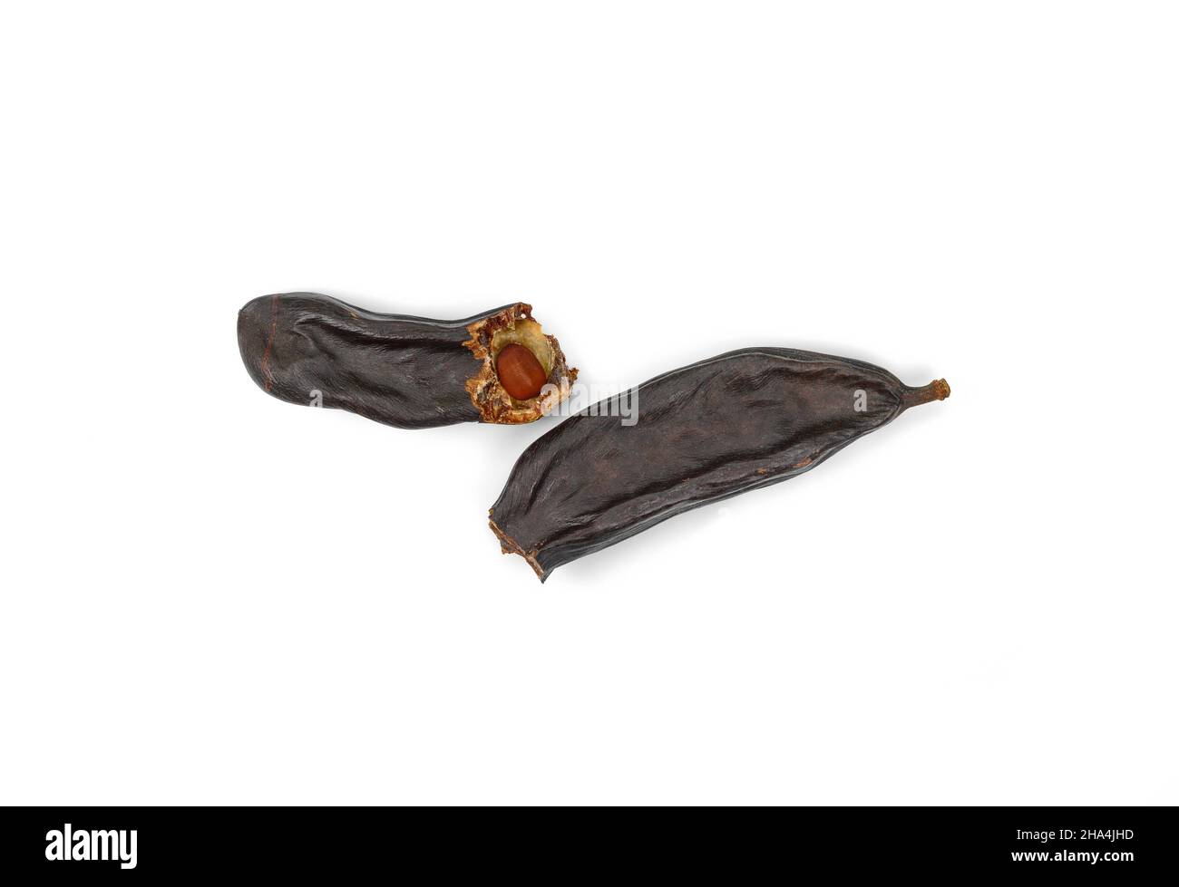 Carob. Ripe carob pods and seed isolated on white background Stock Photo Alamy