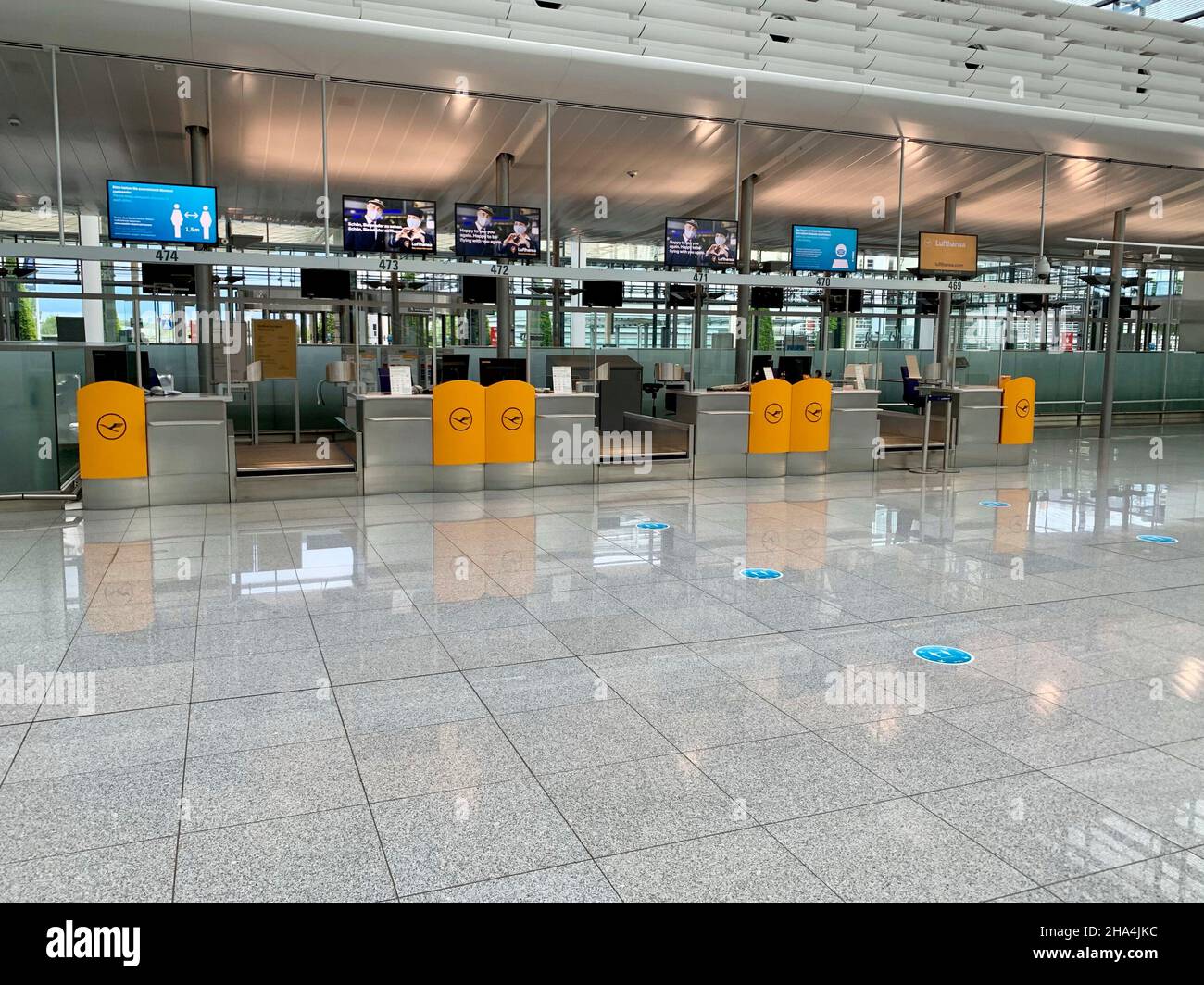 empty check-in area in terminal 2 at munich fjs airport during the 2021 corona pandemic Stock Photo