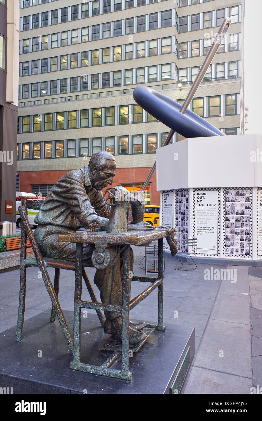 The Garment Worker sculpture by Judith Weller at 7th Avenue.Garment District.Midtown Manhattan, New York City, USA Stock Photo