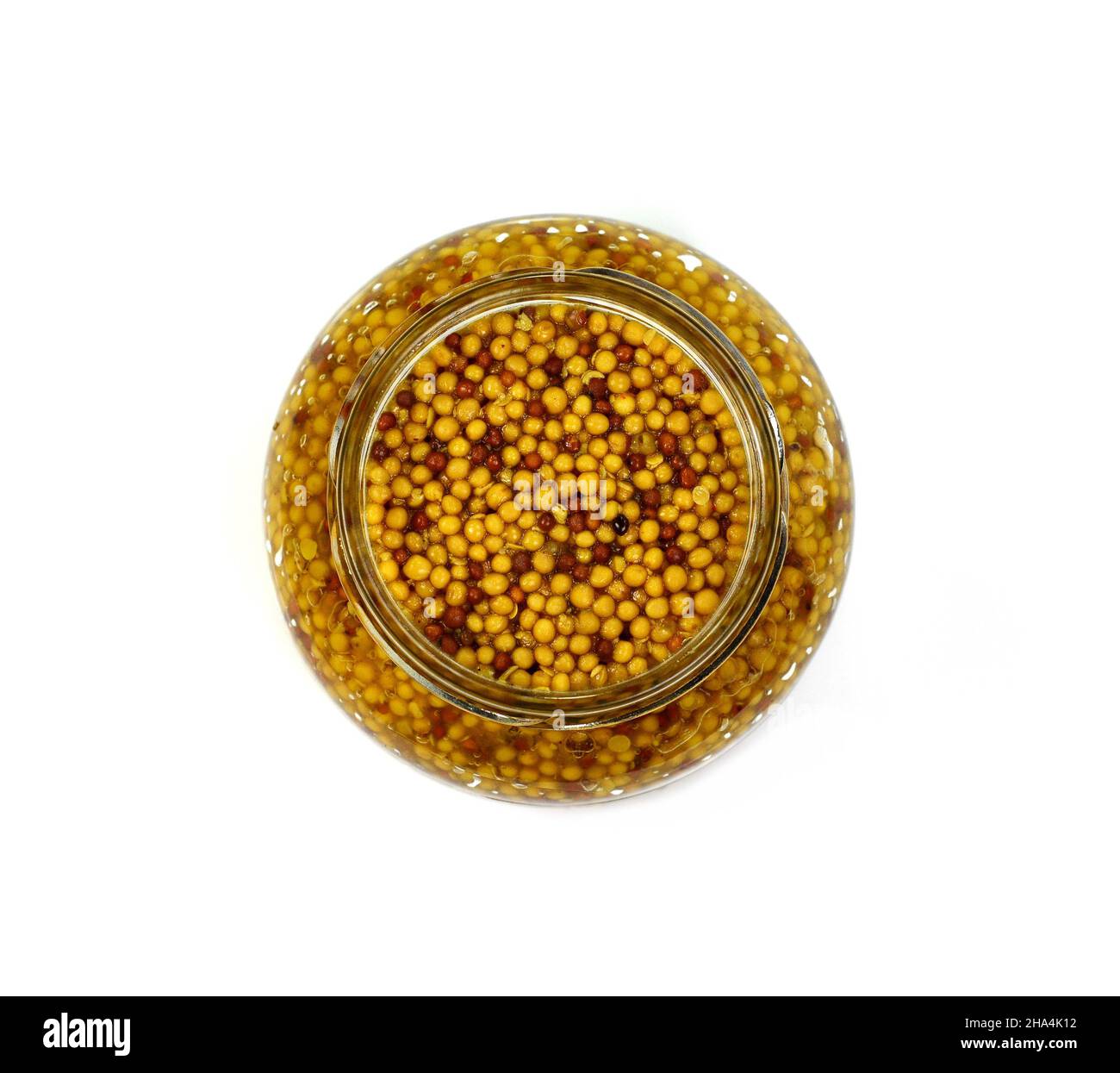 Whole grain mustard. French mustard isolated on white background Stock