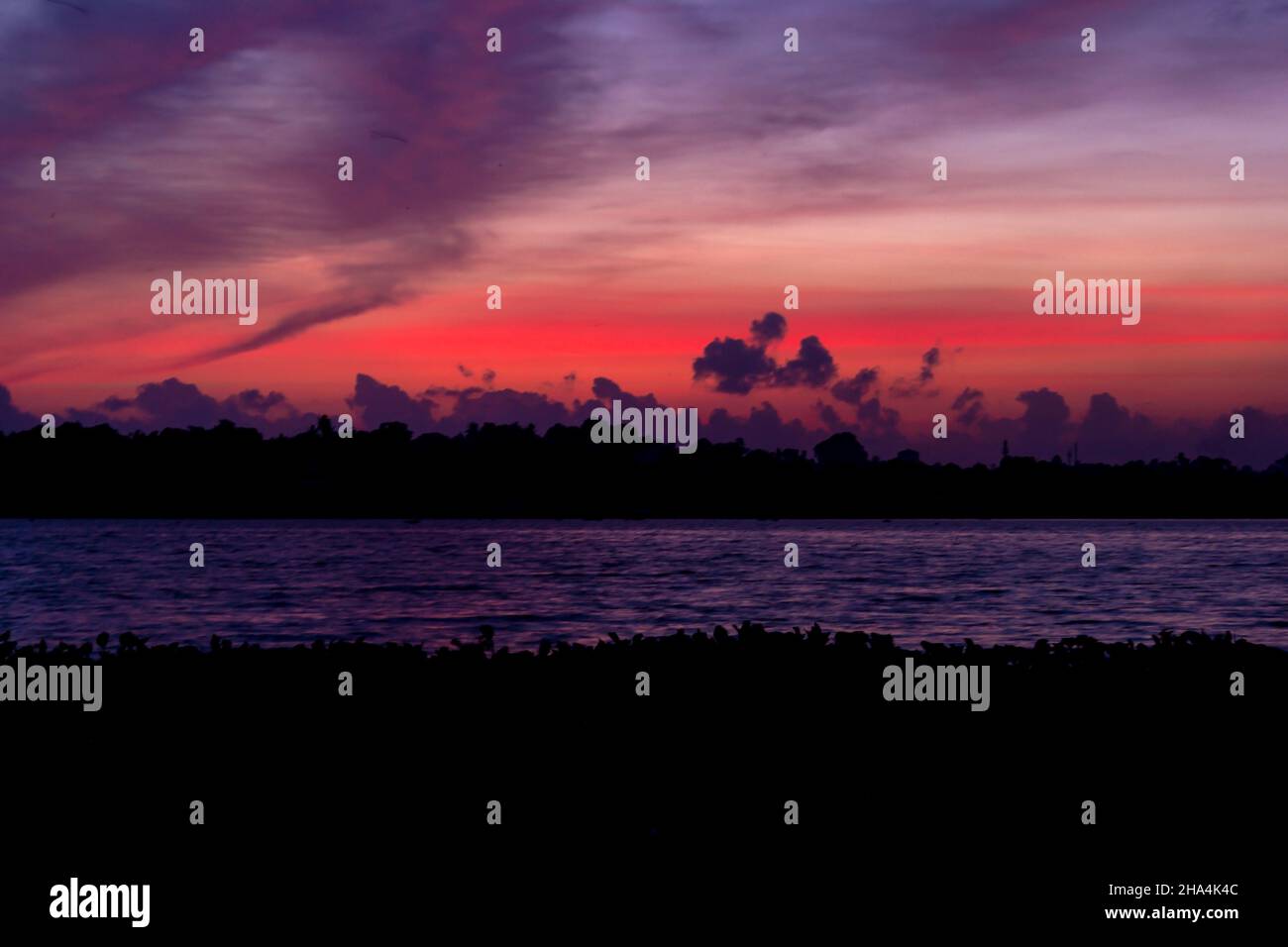 Beautiful scenery of a sky with the colors of sunset over the sea Stock ...