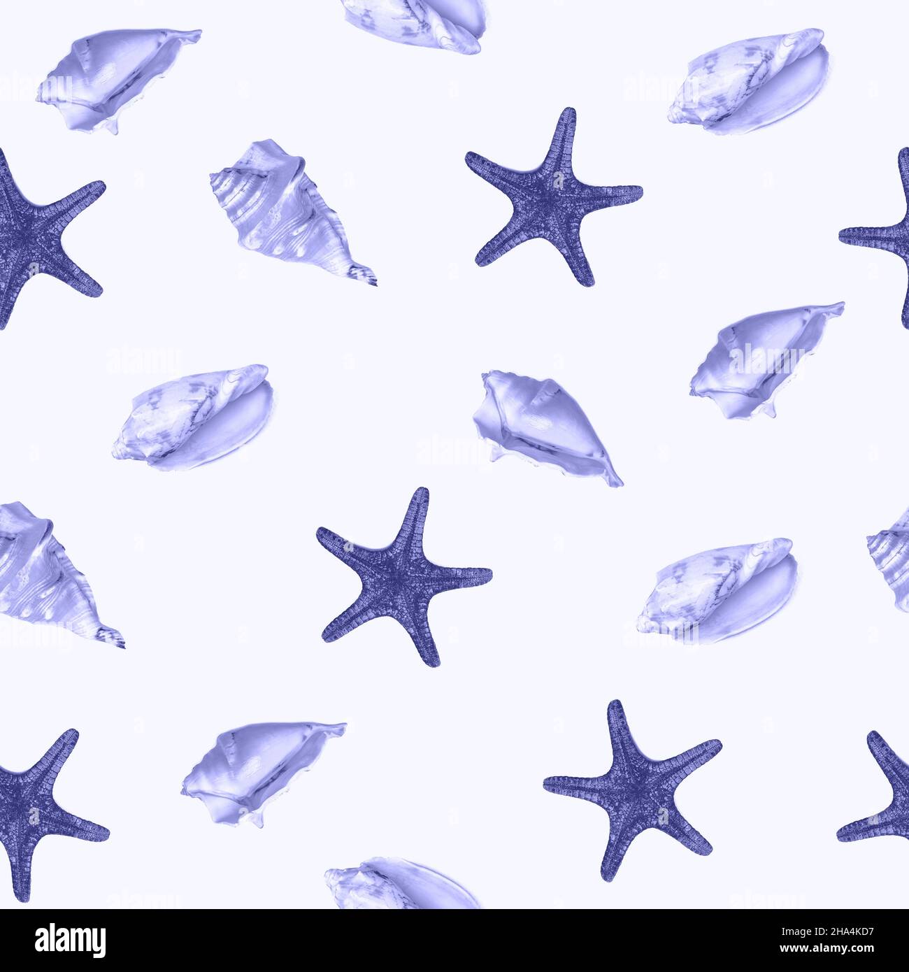 Top view flat lay starfish and seashell seamless pattern on light blue Very Peri background. Stock Photo