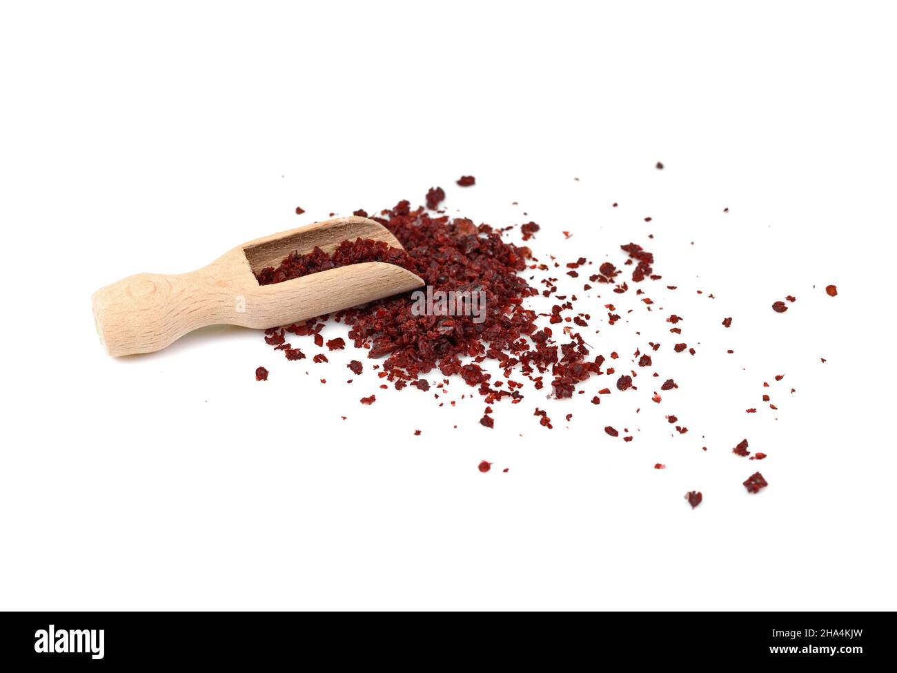 Sumac spice on white. Ground Sumac Powder Spice isolated Stock Photo
