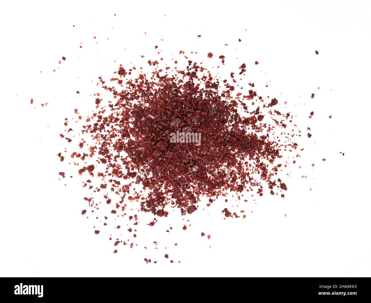 Sumac spice on white. Ground Sumac Powder Spice isolated Stock Photo