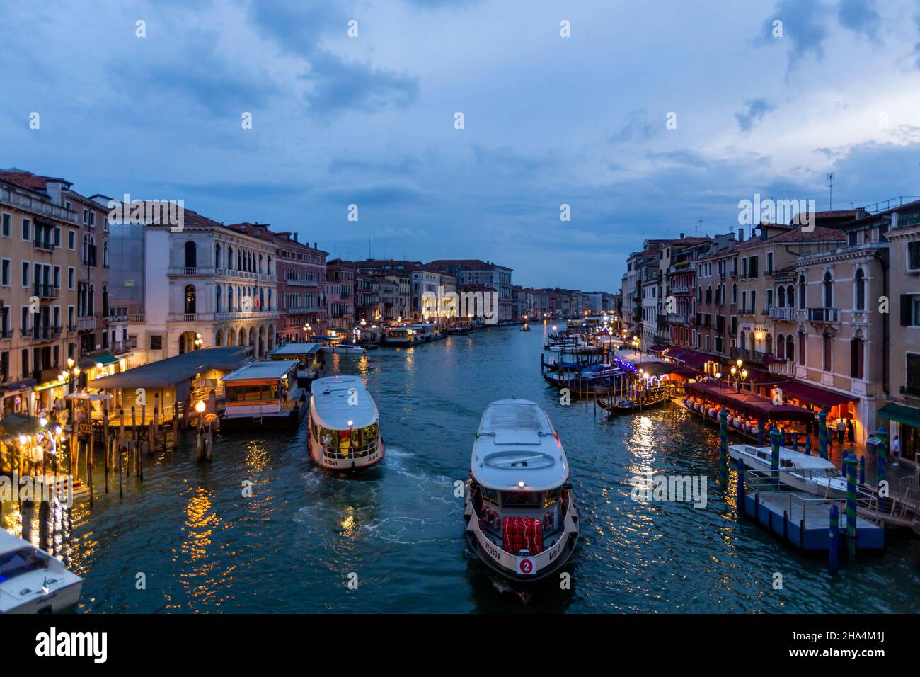 building facades,boats,and gondolas on the canal grande from the rialto bridge (ponte di rialto),venice,italy Stock Photo