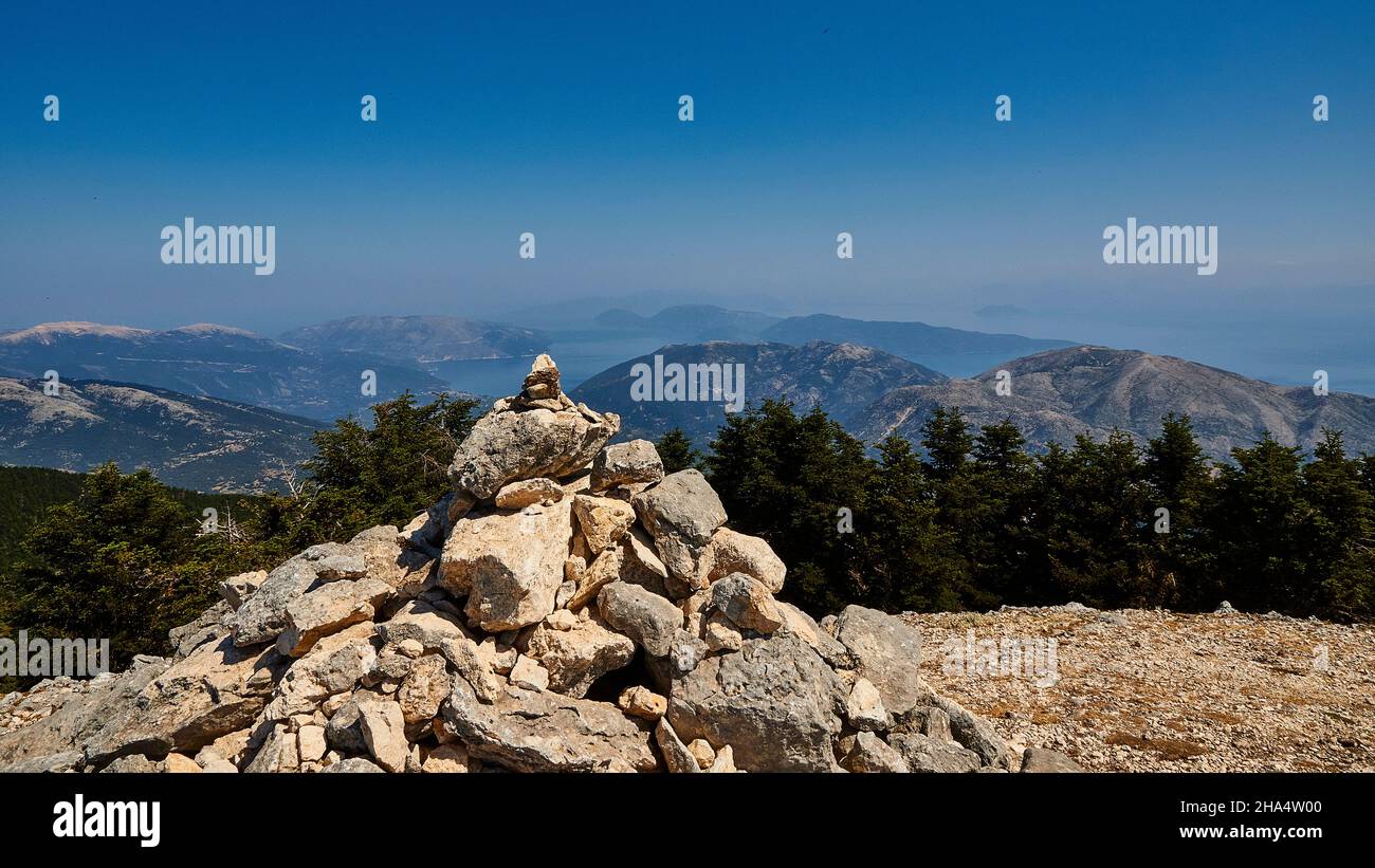 greece,greek islands,ionian islands,kefalonia,mountain,enos,summit,stone pyramid on the summit,looking north towards ithaca Stock Photo