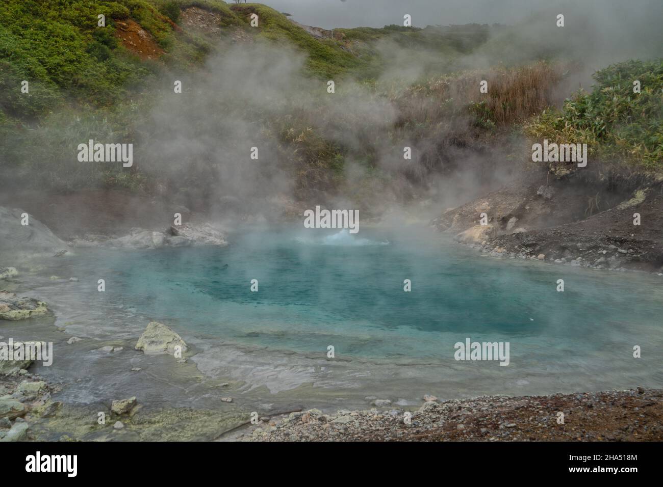 Volcanic activity, sulfur fumarole and hot gas on Iturup Island, Kuril islands, Russia. Stock Photo
