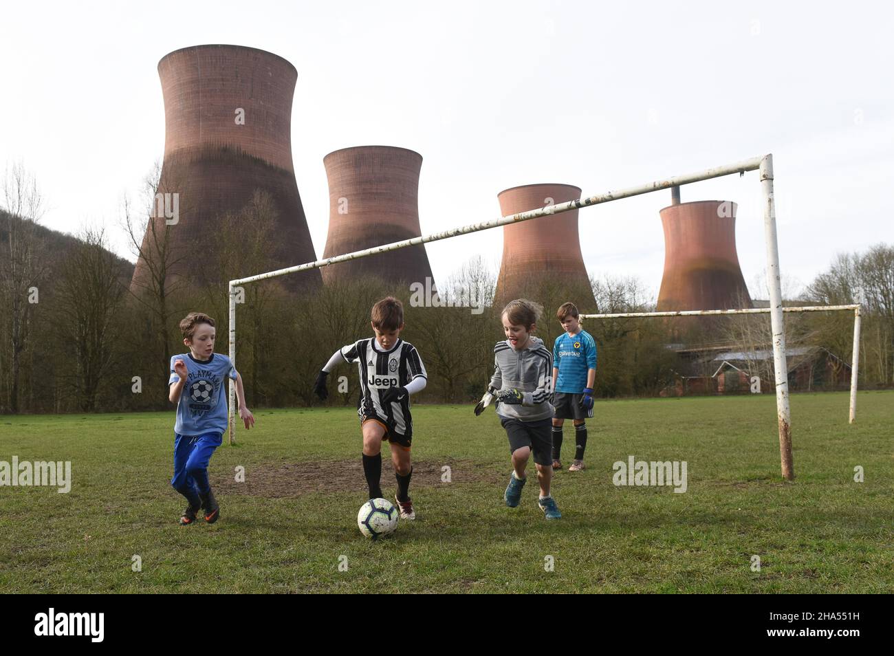 Boys playing football near Ironbridge Power Station 2019 Picture by DAVID BAGNALL Stock Photo