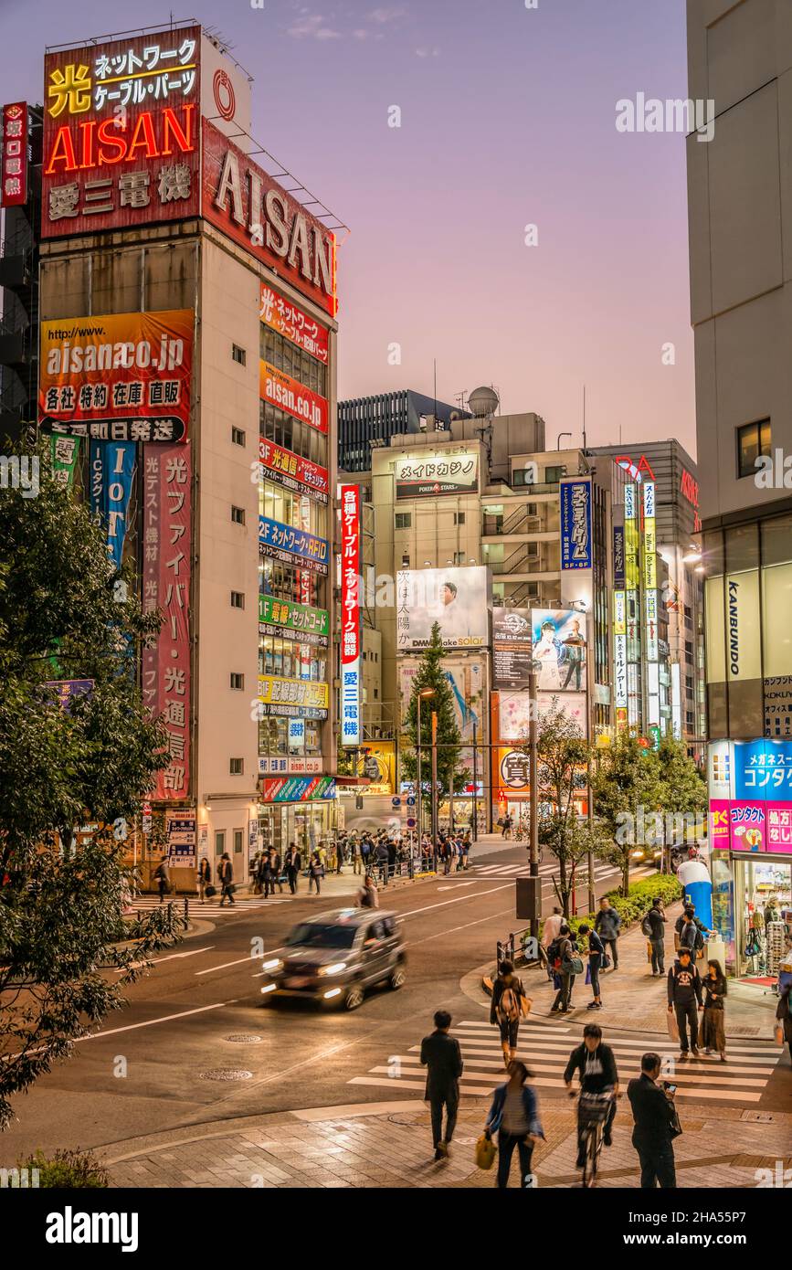 Street scene on Chuo Dori in Akihabara Electric Town district at night, Tokyo, Japan Stock Photo
