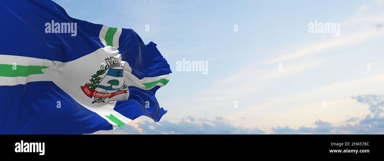 flag of Limeira Sao Paulo , Brazil at cloudy sky background on sunset, panoramic view. Brazilian travel and patriot concept. copy space for wide banne Stock Photo