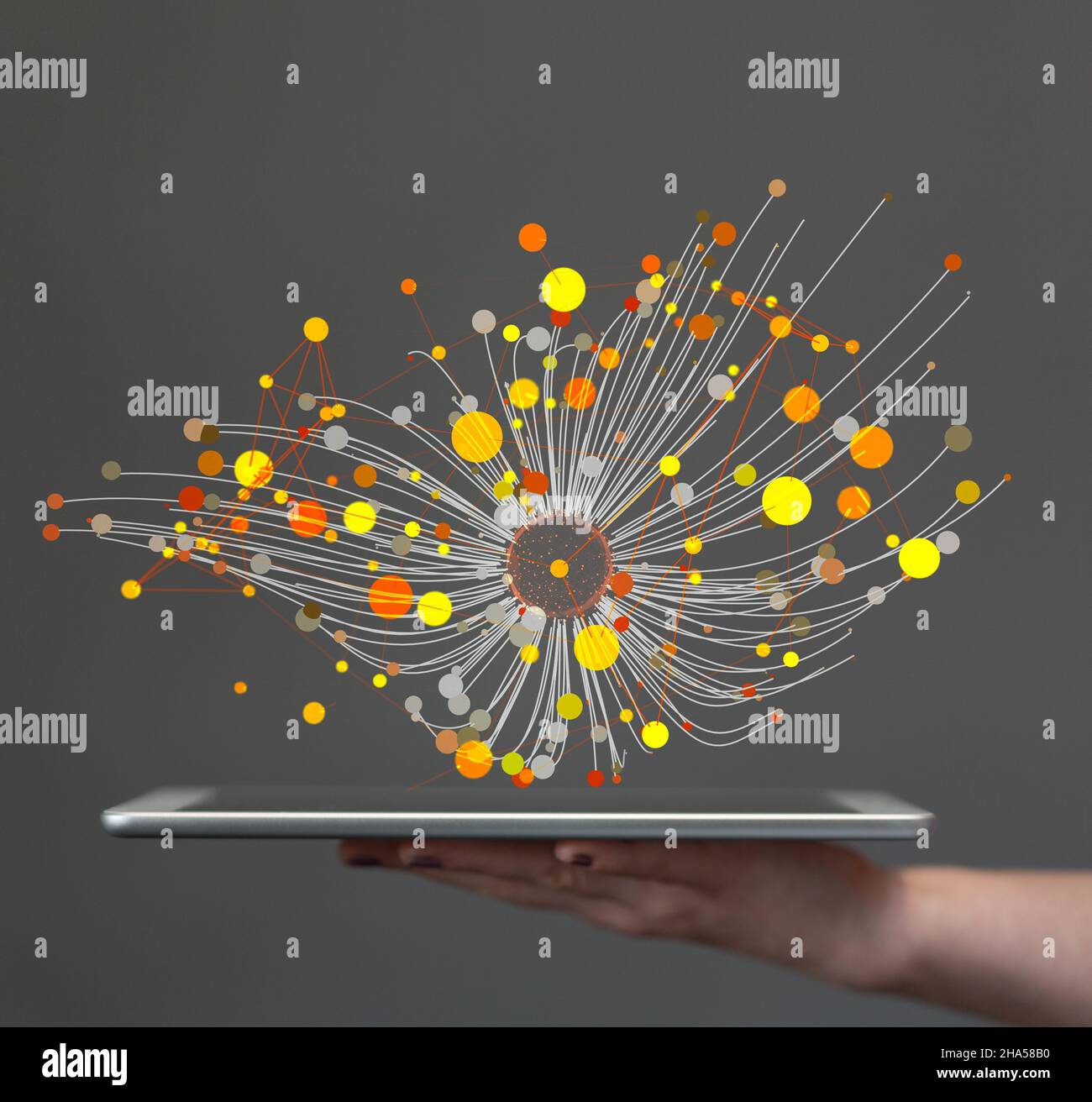 Dots and lines projecting from a man's tablet - networking and diffusion of innovation concept Stock Photo