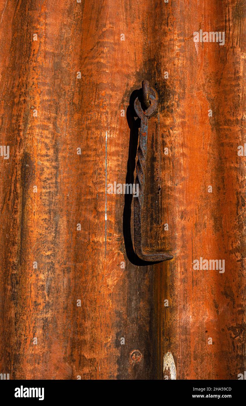 Old Rusty Hook on a Wall Stock Photo
