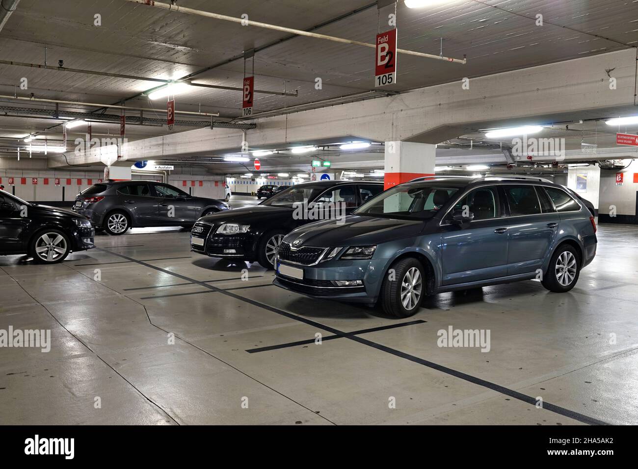germany,north rhine-westphalia,cologne,multi-storey car park,parking spaces,parked cars,inside Stock Photo