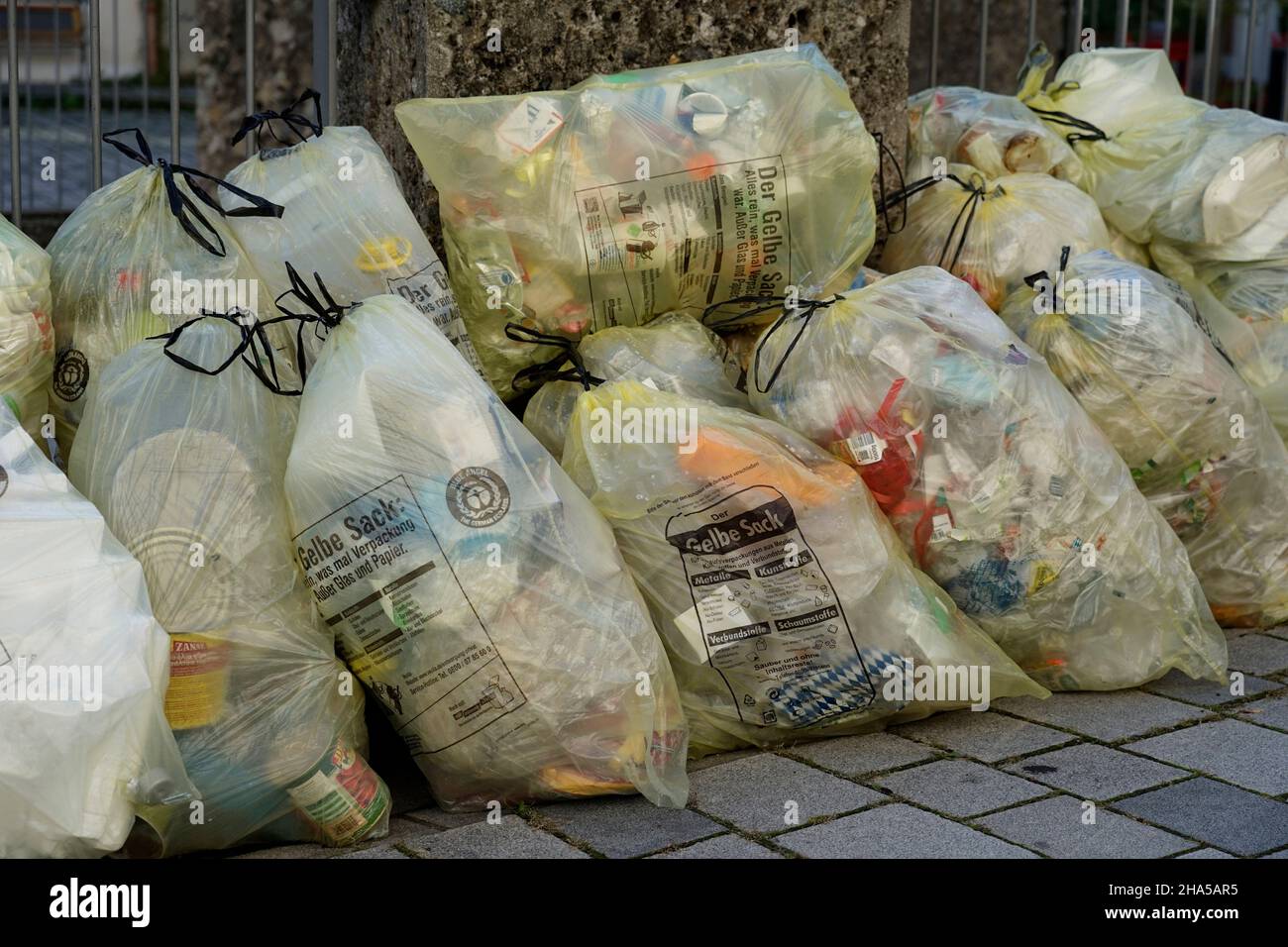 germany,bavaria,altötting district,waste separation,yellow bags on the roadside,before collection Stock Photo