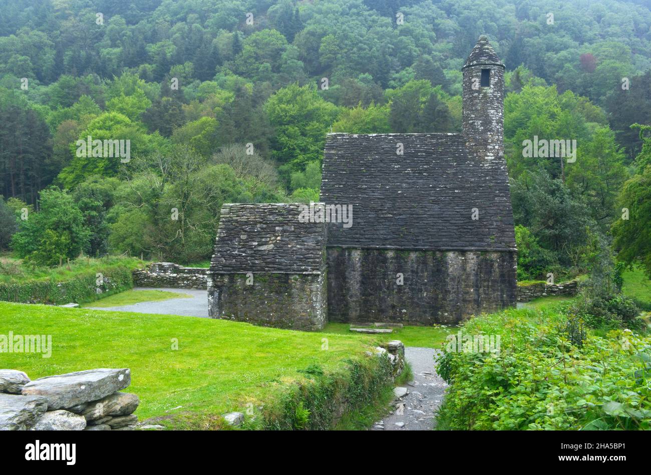 europe,republic of ireland,county wicklow,glendalough monastery complex,st. kevin's kitchen chapel Stock Photo