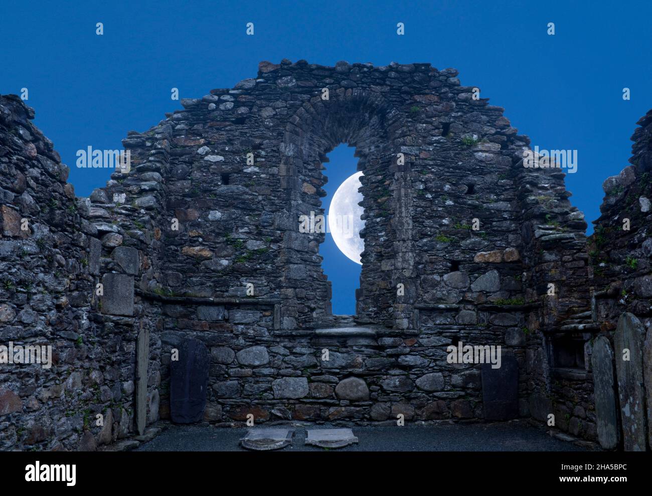 europe,republic of ireland,county wicklow,glendalough monastery complex,cathedral ruin,moonlit night Stock Photo