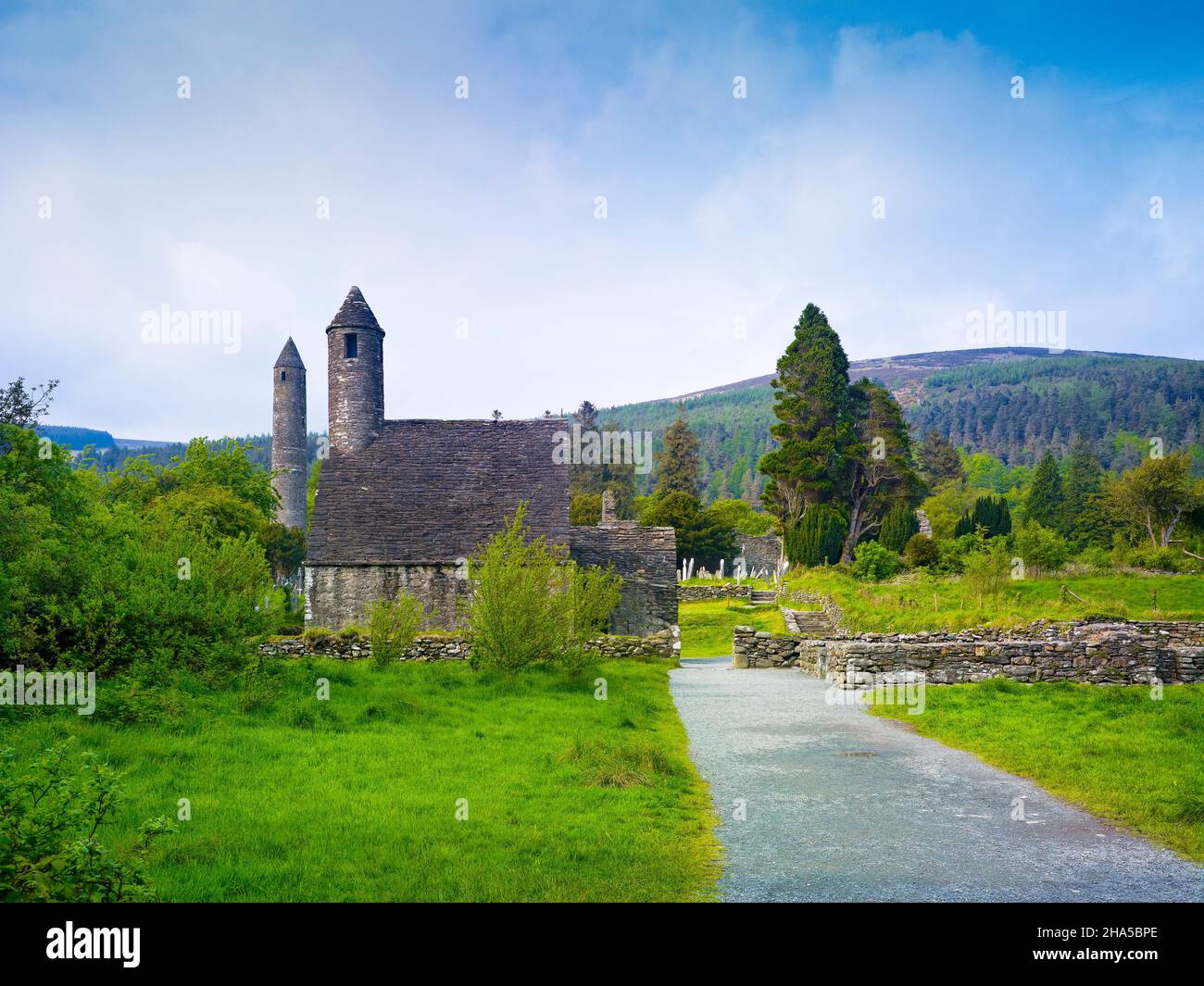 europe,republic of ireland,county wicklow,glendalough monastery complex,round tower and chapel of st. kevin's kitchen Stock Photo