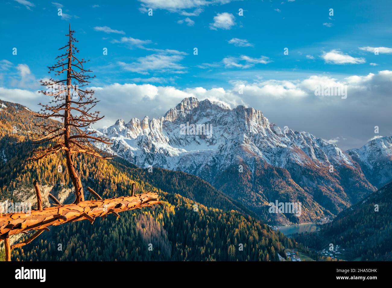 a view of monte civetta from the belvedere of colle santa lucia,with the iron sculpture by valentino moro to symbolize the rebirth after the vaia storm that destroyed hectares of wood in the dolomites,colle santa lucia,belluno,veneto,italy Stock Photo