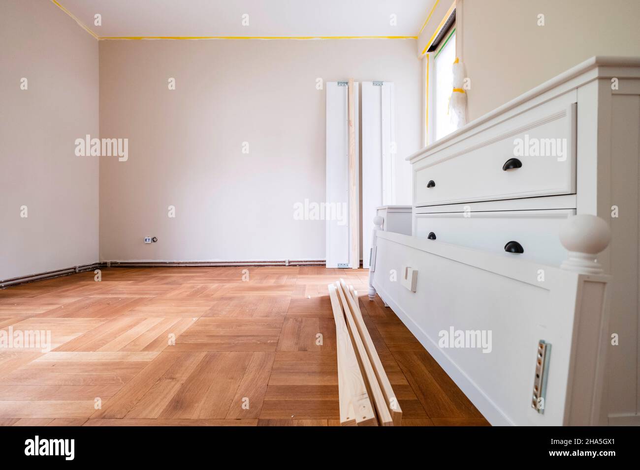 construction site,refurbishment and renovation of an apartment,empty room with real wood floor Stock Photo