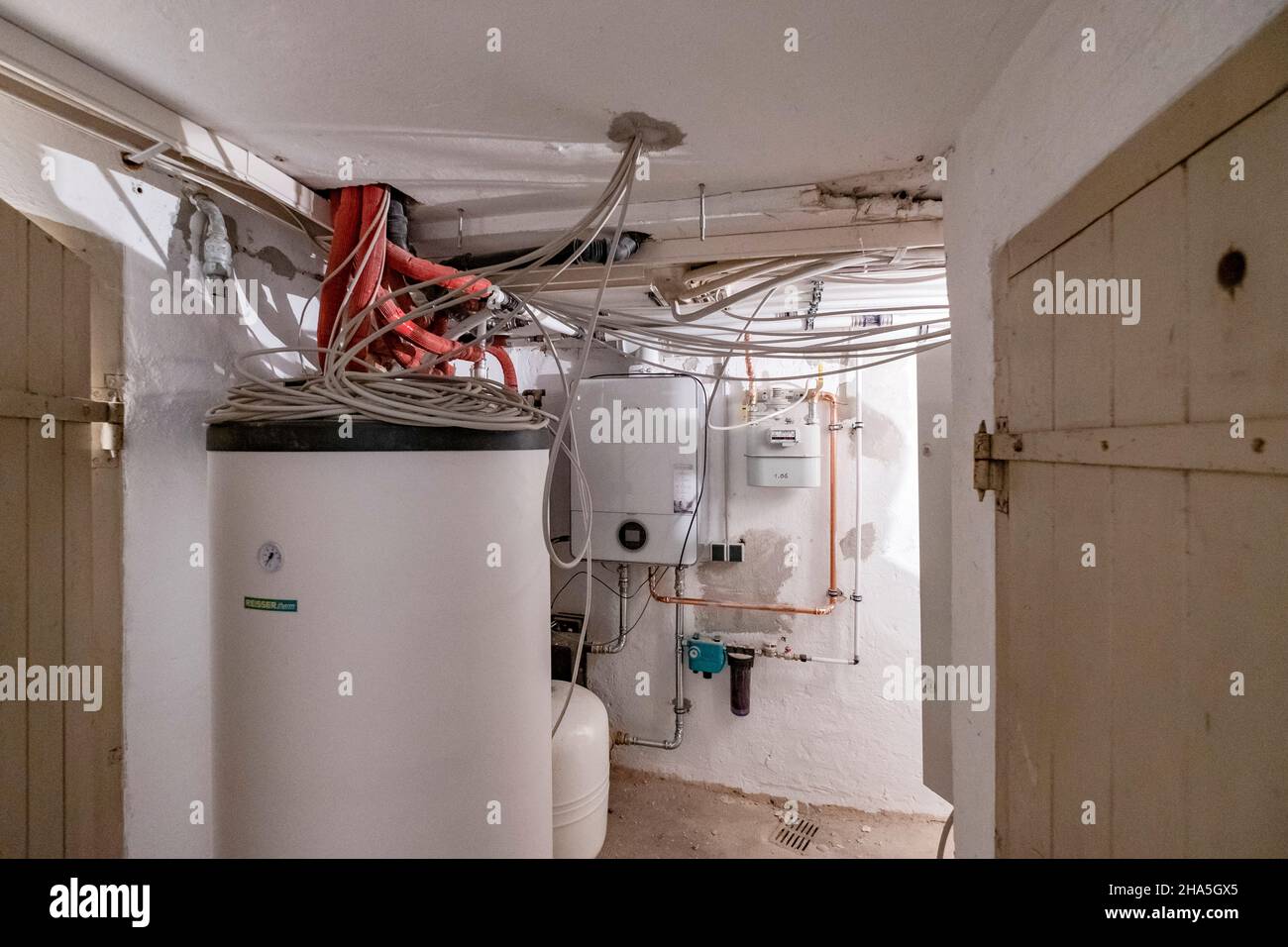 construction site,refurbishment and renovation of an apartment,boiler room with new gasterme Stock Photo
