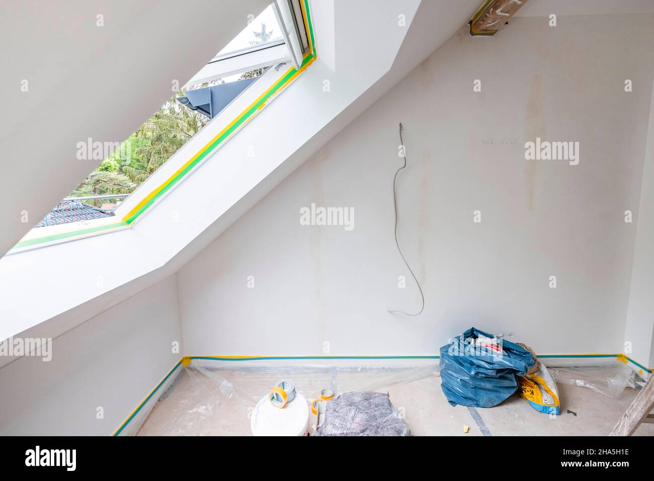 construction site,redevelopment and renovation of an apartment,empty room with an open skylight Stock Photo
