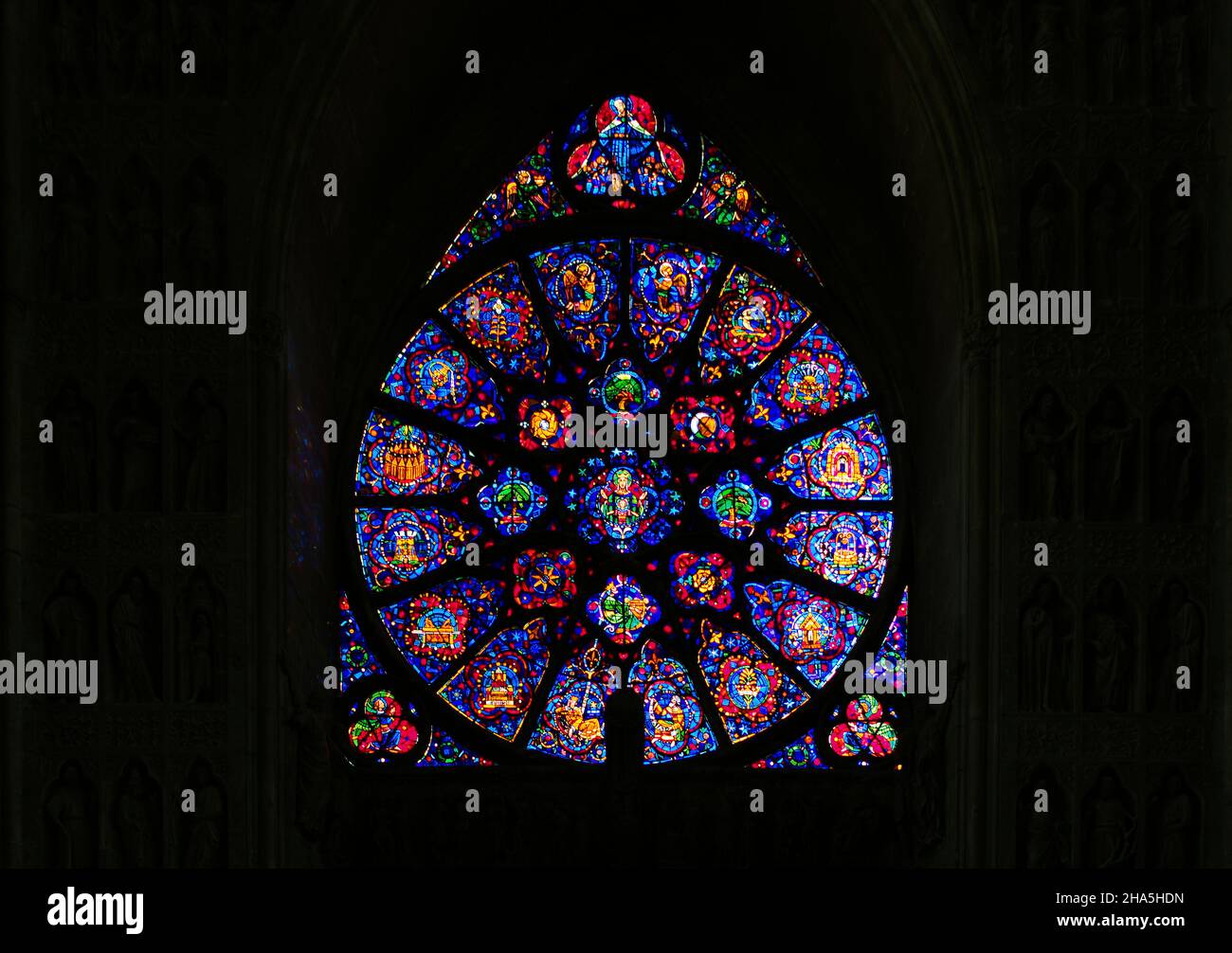 rose window,historical,colored glass window,west facade,notre-dame cathedral,unesco world heritage site,reims,champagne,france Stock Photo