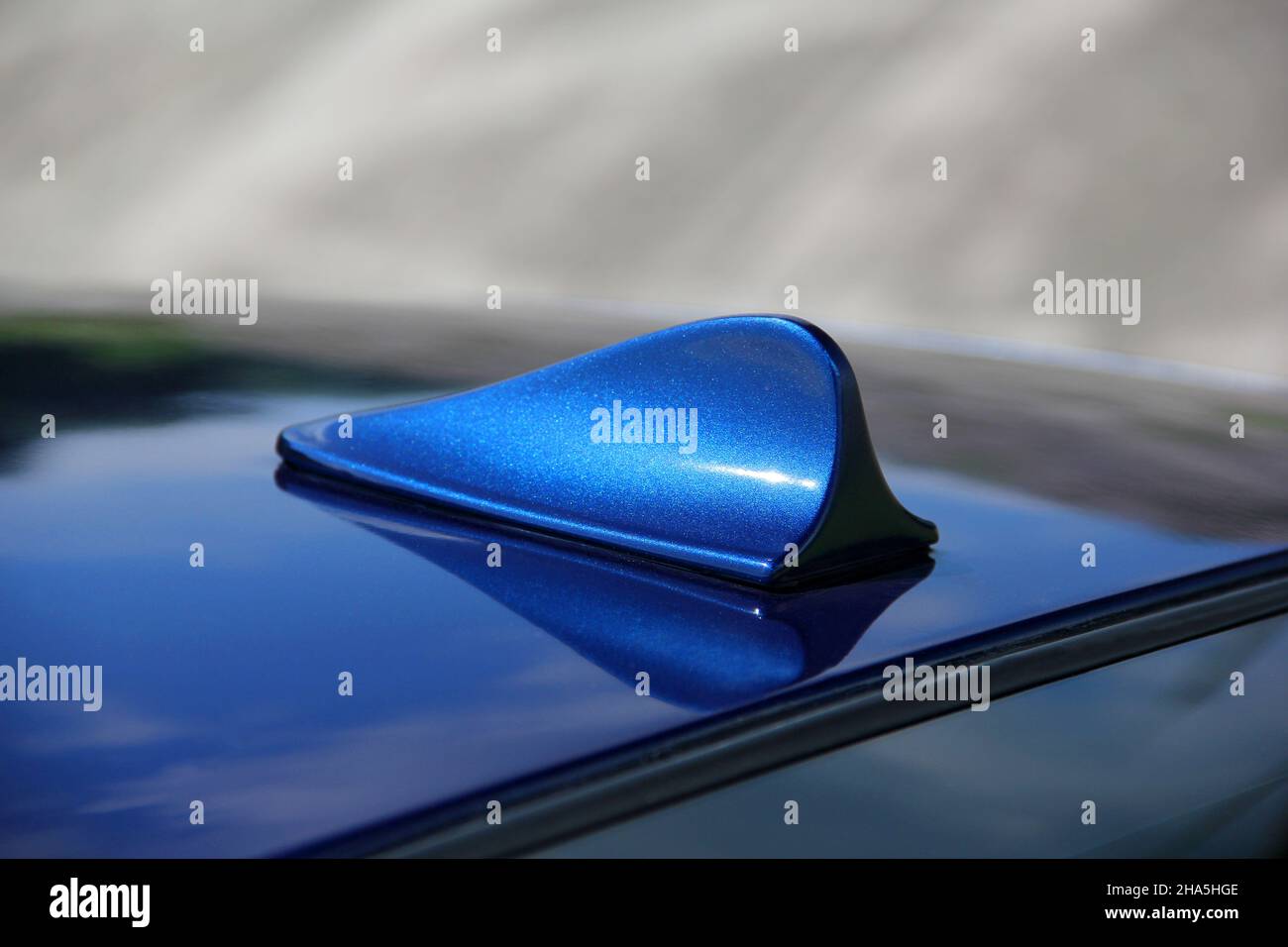Car antenna. Part of a blue car Stock Photo Alamy