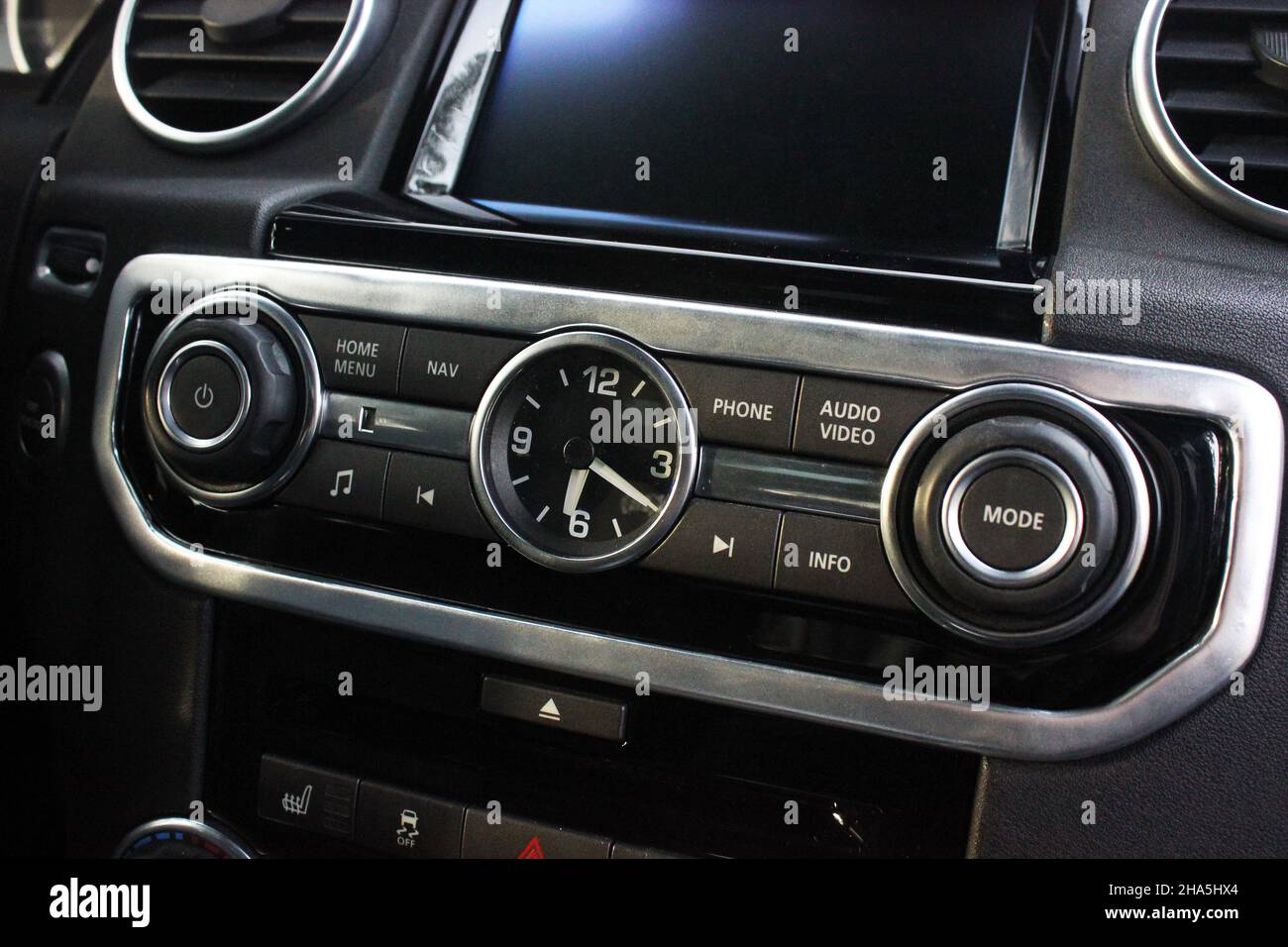 Clock in the car. Car interior luxury service. Car interior details