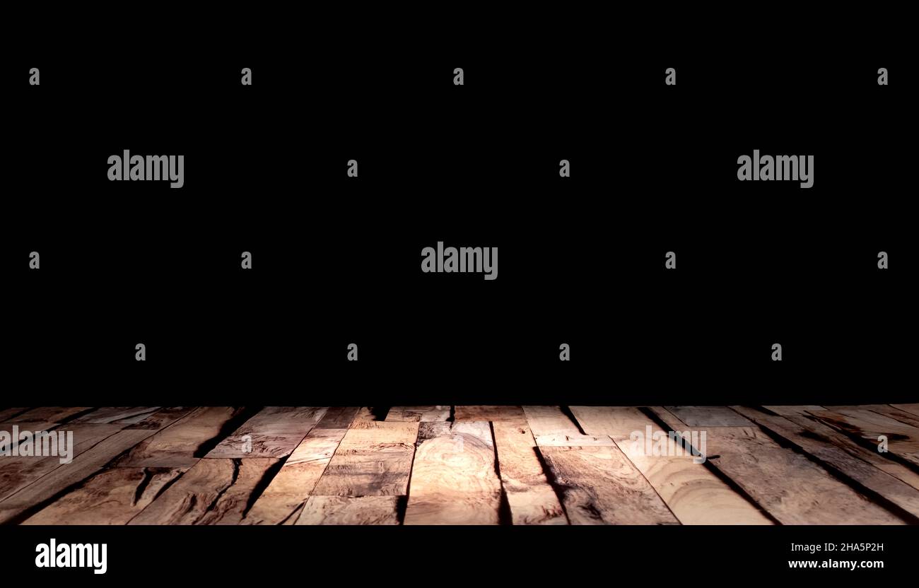 Wooden table on black background. Black background with wooden support ...
