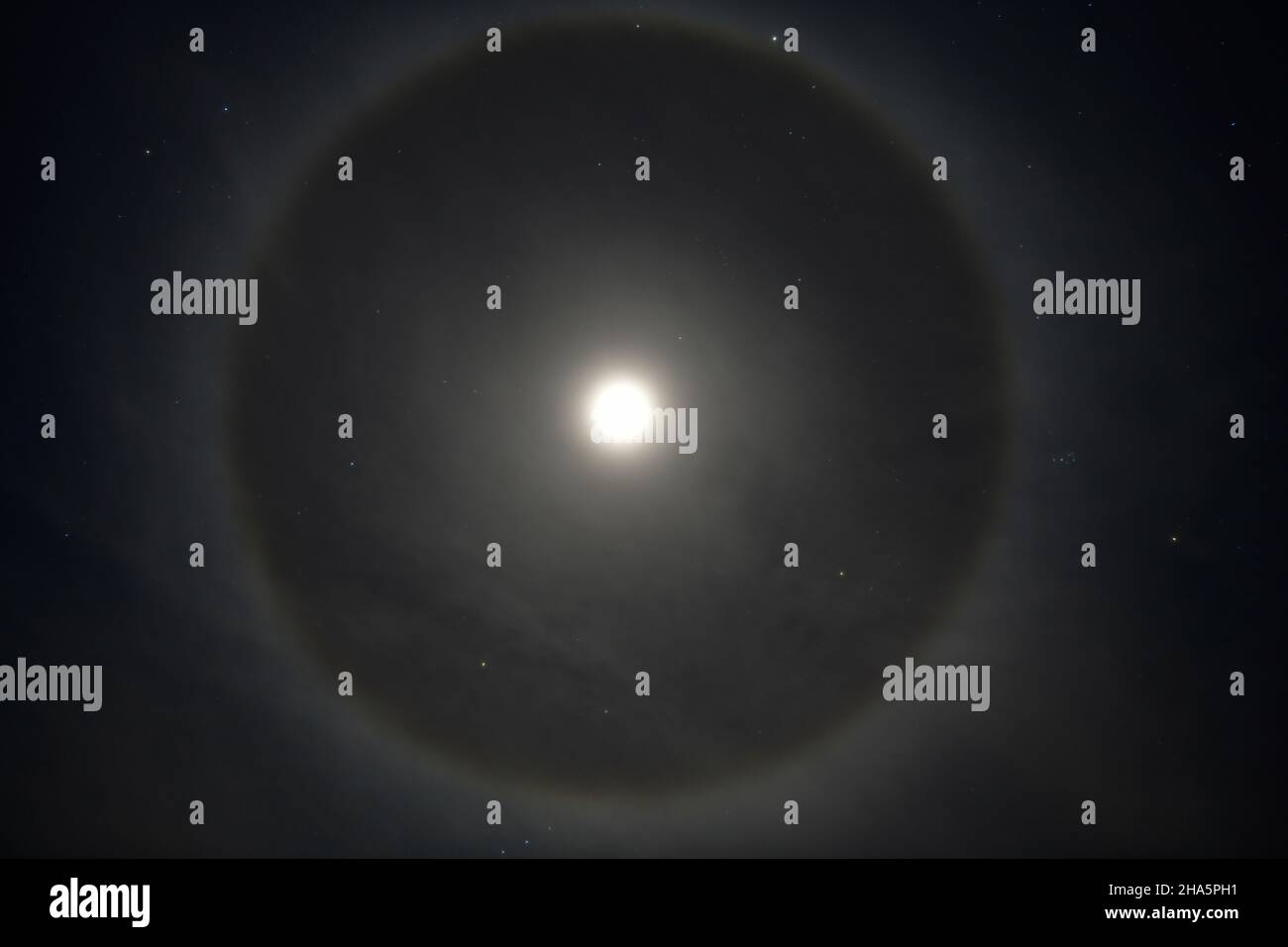 The full moon with halo ring in the clear sky hi-res stock photography ...