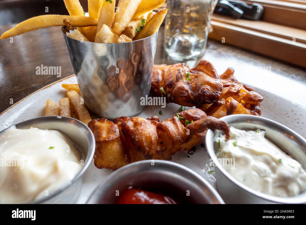 Restaurant dining food plate dish fried fish fillets tartar sauce hi ...