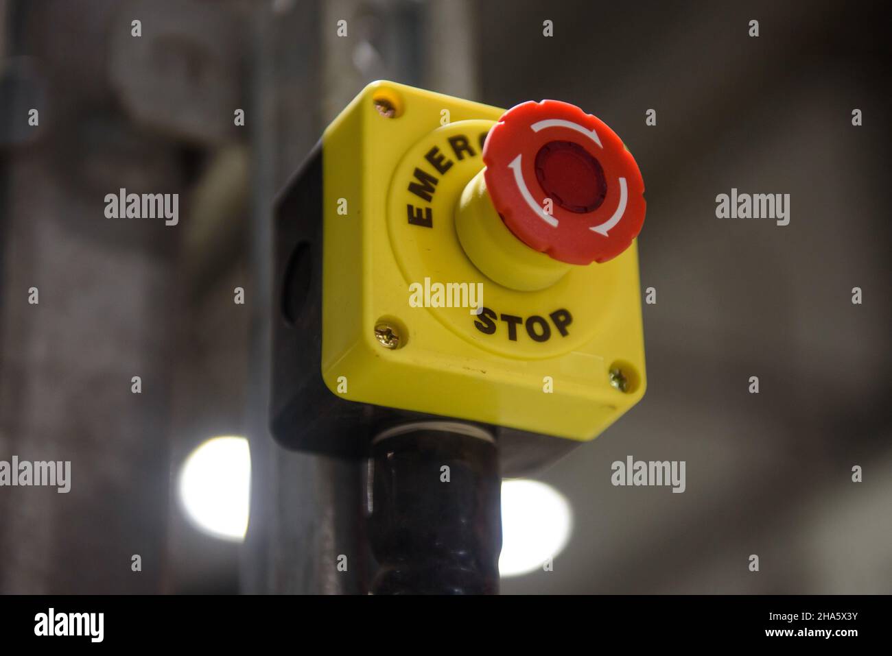 Red emergency stop button close-up Stock Photo