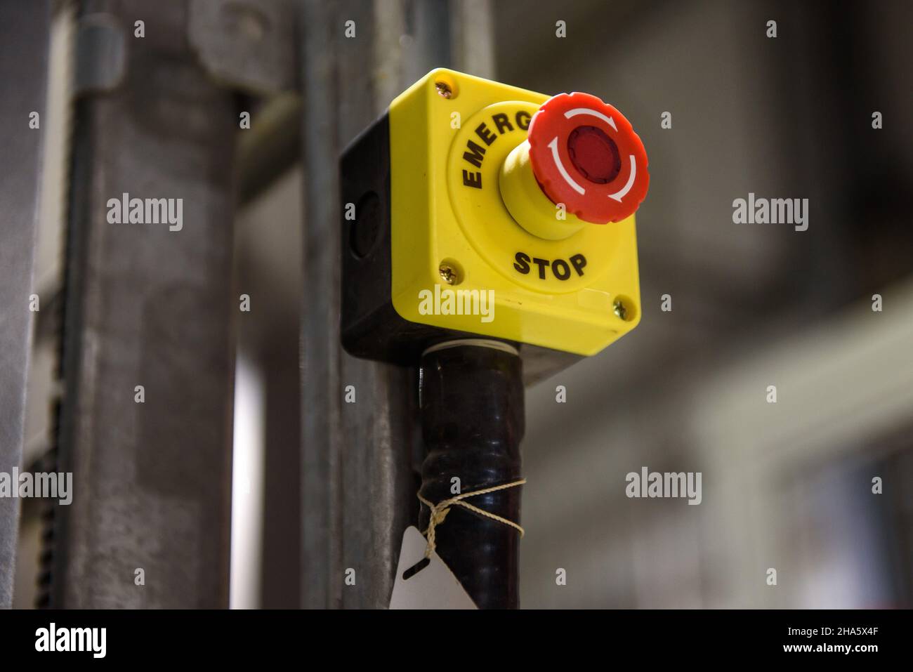 Red emergency stop button close-up Stock Photo