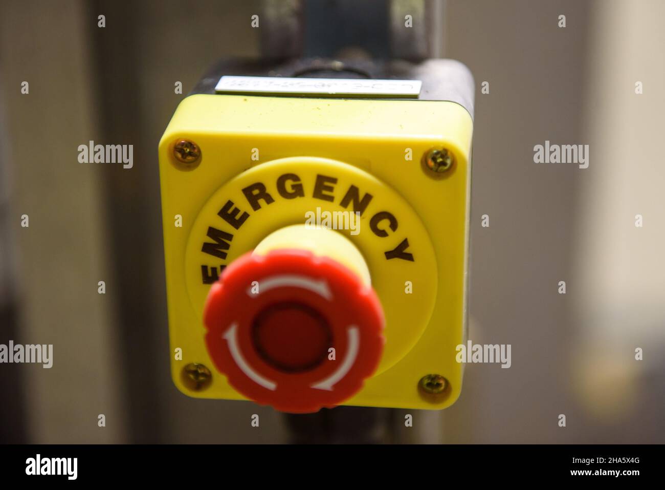 Red emergency stop button close-up Stock Photo - Alamy