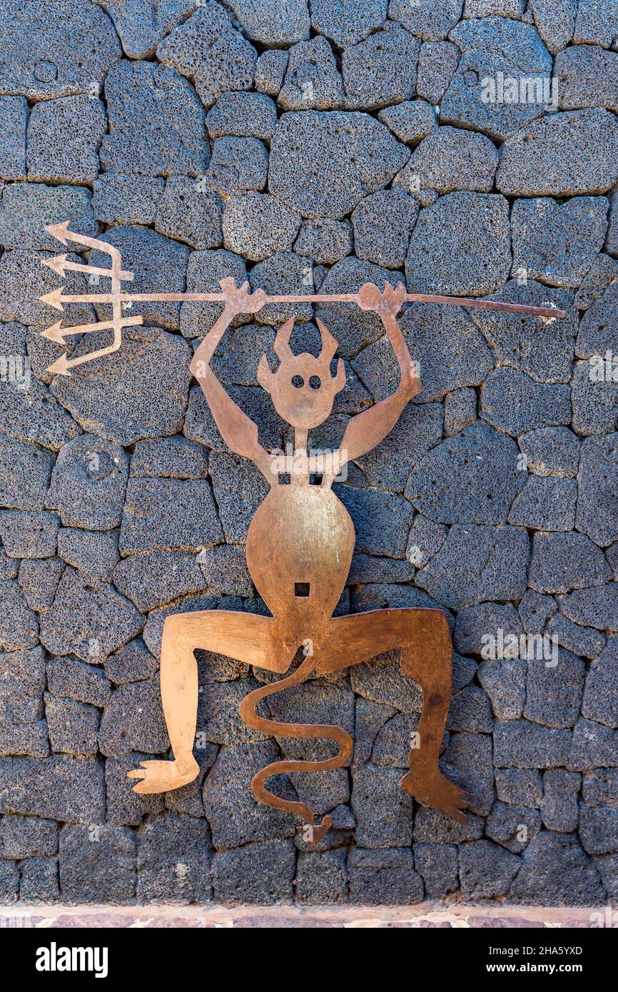 entrance to the restaurant,devil sculpture el diablo,logo designed by césar manrique,artist from lanzarote,timanfaya national park,parque nacional de timanfaya,montanas del fuego,lanzarote,canaries,canary islands,spain,europe Stock Photo