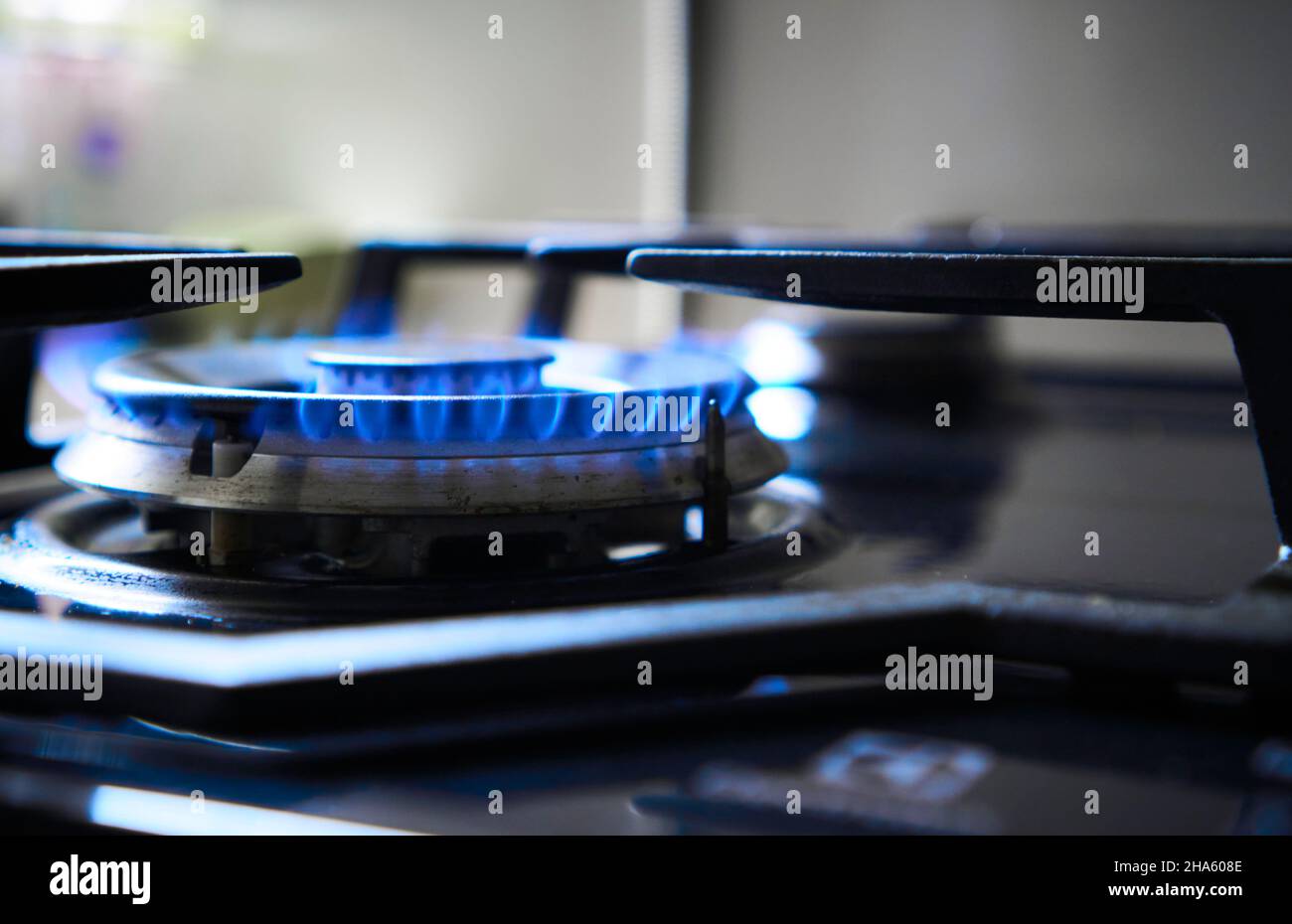 Kitchen stove grate on a burner fuelled by combustible natural gas or