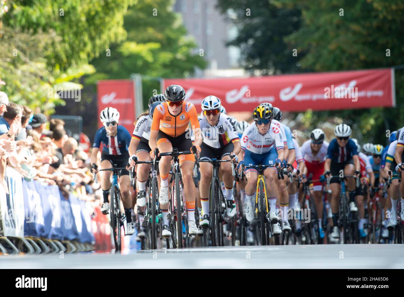 The women's peloton on a climb in Leuven, Belgium during the UCI Road Cycling World Championships. Stock Photo
