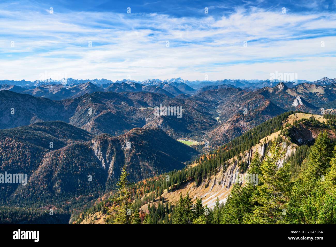 view from the risserkogel over the bavarian prealps to the karwendel and zugspitze on a sunny day in autumn. mountains,hills and forests under a blue sky. mangfall mountains,bavaria,germany,europe Stock Photo