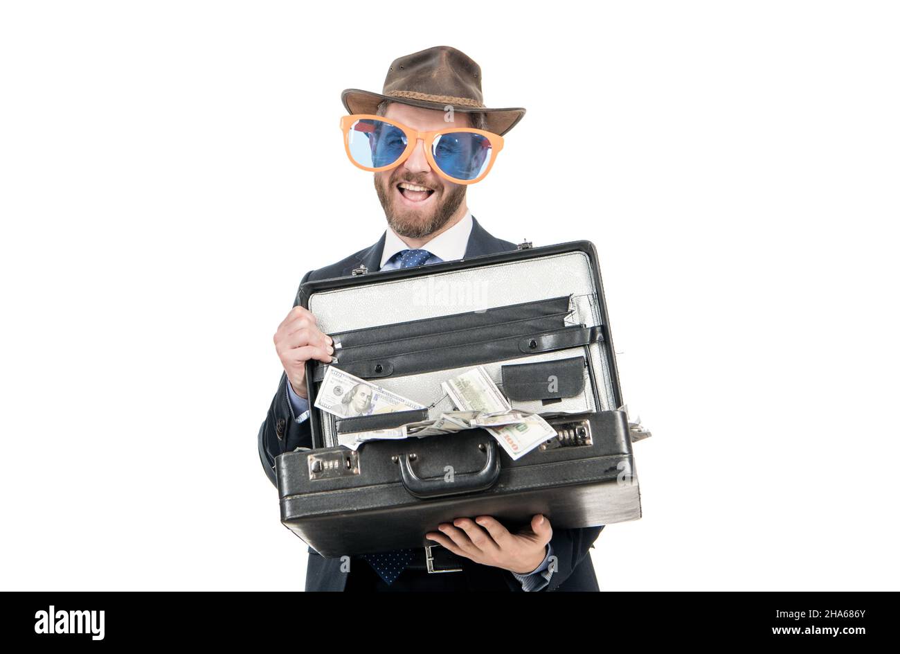 Become a millionaire. Happy banker hold suitcase with money. Millionaire. Rich man. Jackpot winner Stock Photo