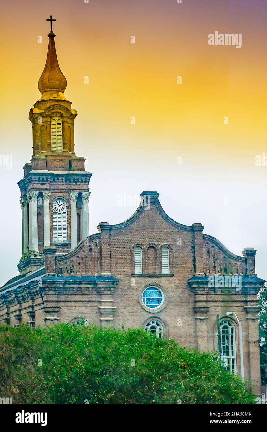 St. John the Baptist Catholic Church is pictured, Dec. 7, 2021, in New Orleans, Louisiana. The 1868 Neo-Renaissance church has a gold steeple. Stock Photo