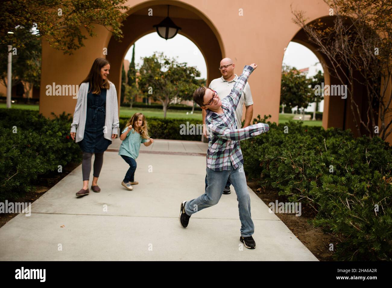 Ten Year Old Photo Bombing Family in San Diego Stock Photo
