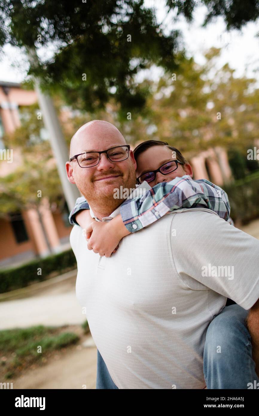 Dad with Son on Piggyback in San Diego Stock Photo
