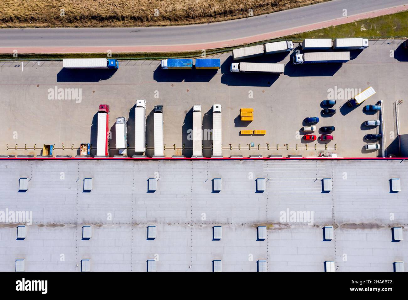 Trucks leaving warehouse aerial hires stock photography and images Alamy