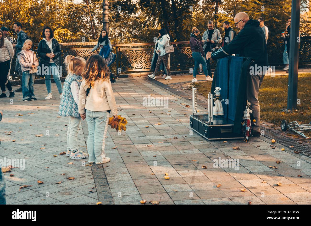 Actor shows a puppet show in a park in Kyiv in autumn Stock Photo Alamy