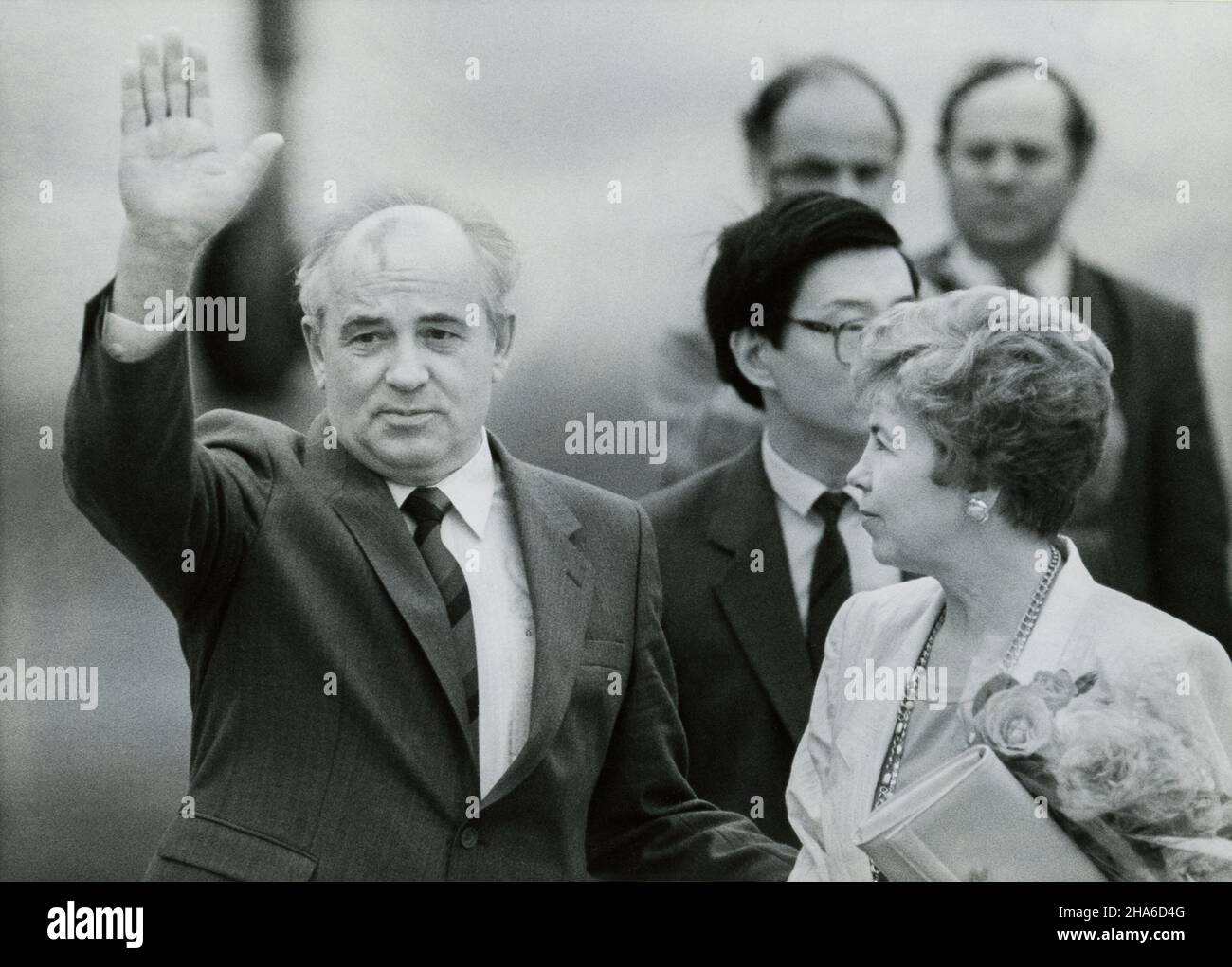 Former leader of the Soviet Union Mikhail Gorbachev and his wife Raisa depart from Beijing Airport in May 1989 after a summit with Chinese leaders including Deng Xiaoping. The visit is considered the end of the 'Sino-Soviet split.' Stock Photo