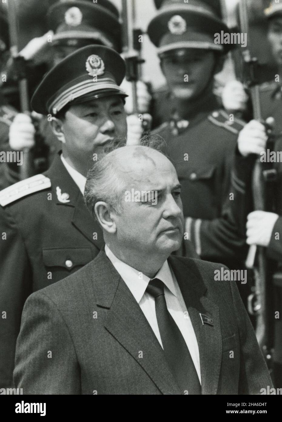 Former leader of the Soviet Union Mikhail Gorbachev reviews a Chinese honor guard at the Beijing Airport in May 1989 to begin a Sino-Soviet summit. Stock Photo